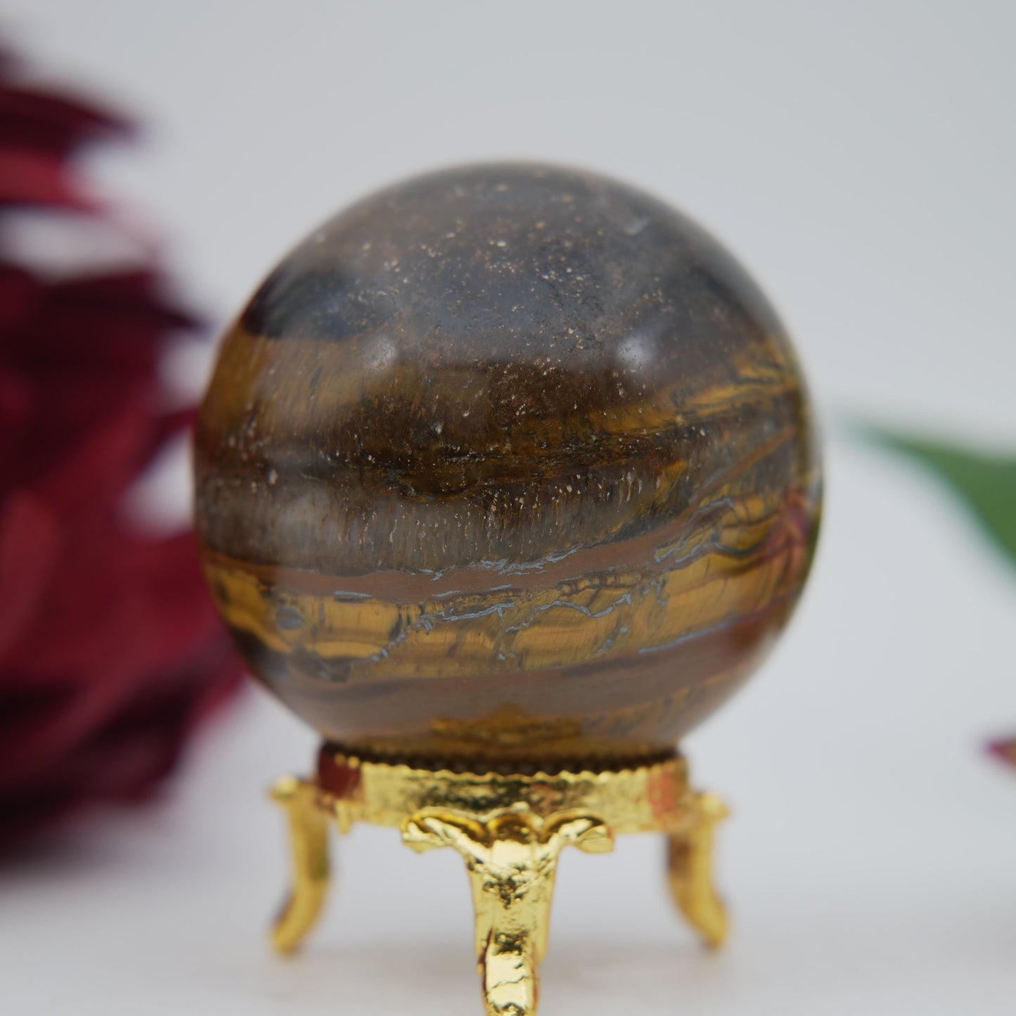 Polished Tiger Eye Sphere 210G 55M featuring natural patterning and unique variations - Positive Faith Hope Love