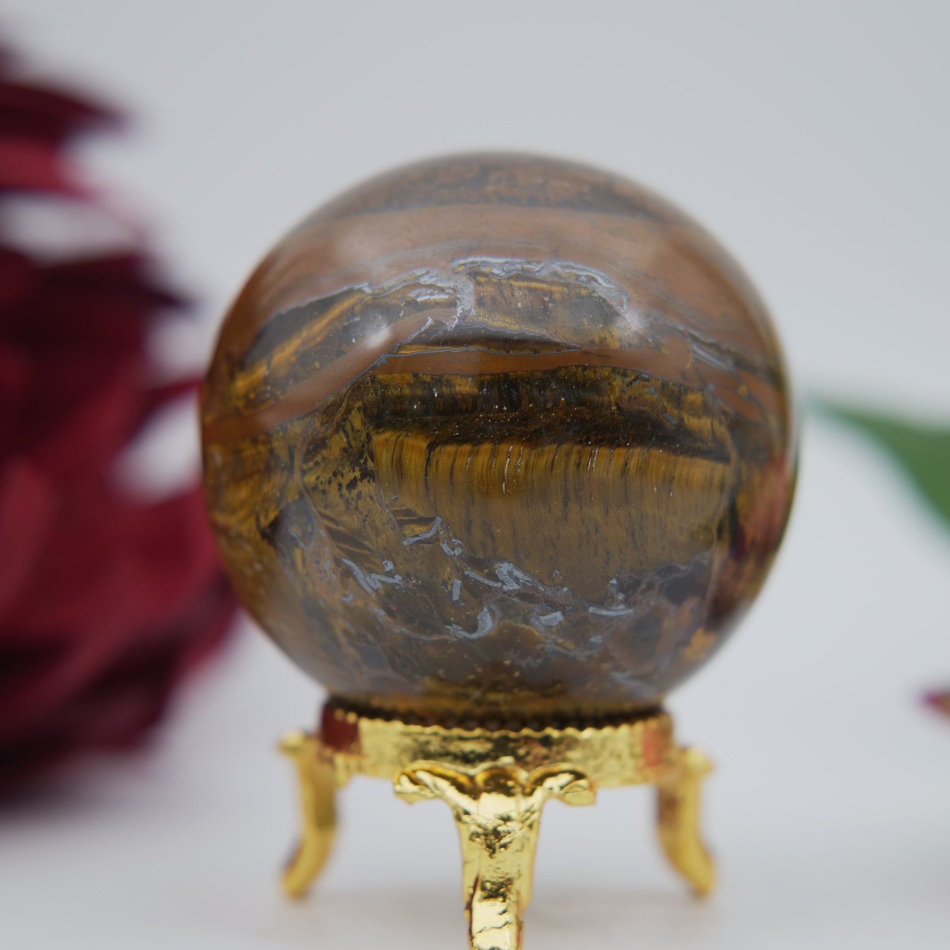 Polished Tiger Eye Sphere 210G 55M featuring natural patterning and unique variations - Positive Faith Hope Love