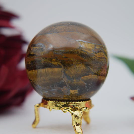 Polished Tigers Eye Sphere 210g 55mm featuring chatoyant golden-brown bands - Positive Faith Hope Love