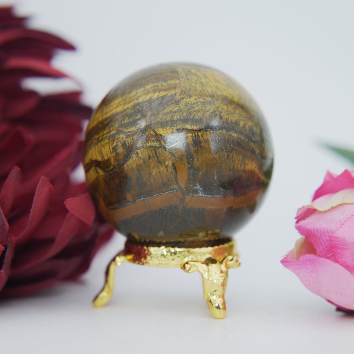 Polished Tigers Eye Sphere 215g 50mm featuring chatoyant golden-brown bands - Positive Faith Hope Love