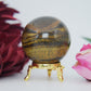 Polished Tigers Eye Sphere 215G 50Mm featuring chatoyant golden-brown bands - Positive Faith Hope Love