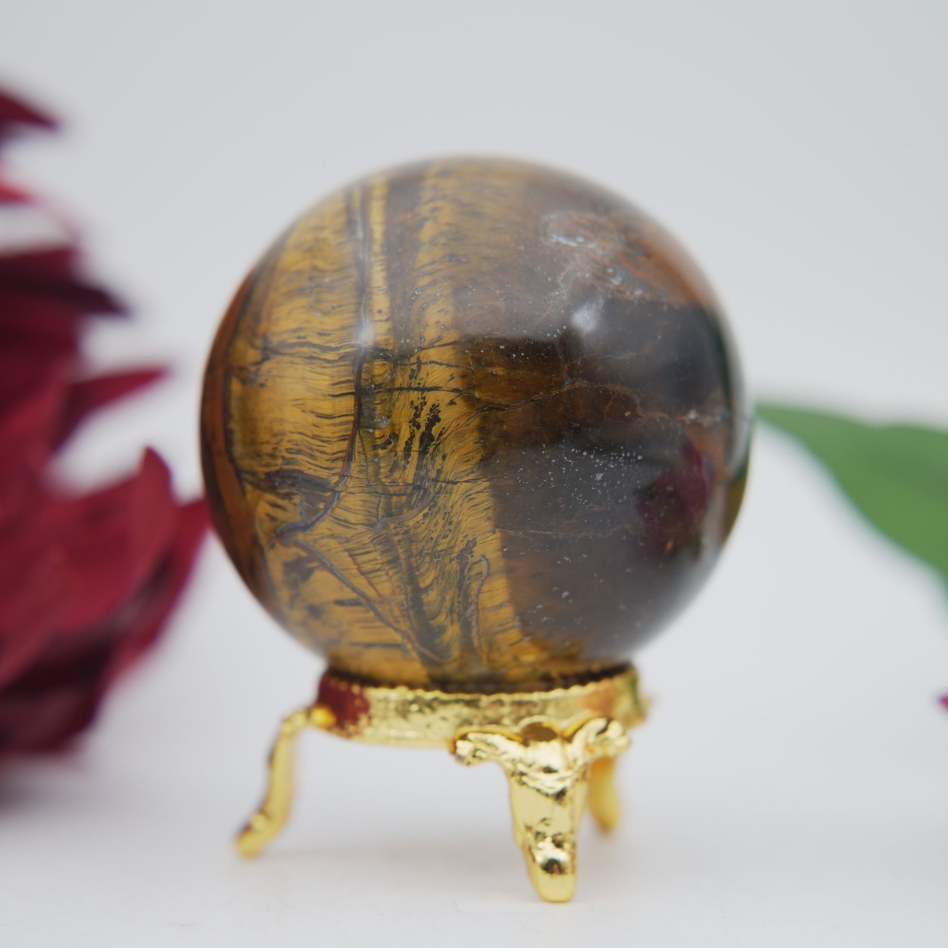 Polished Tigers Eye Sphere 215G 50Mm featuring chatoyant golden-brown bands - Positive Faith Hope Love