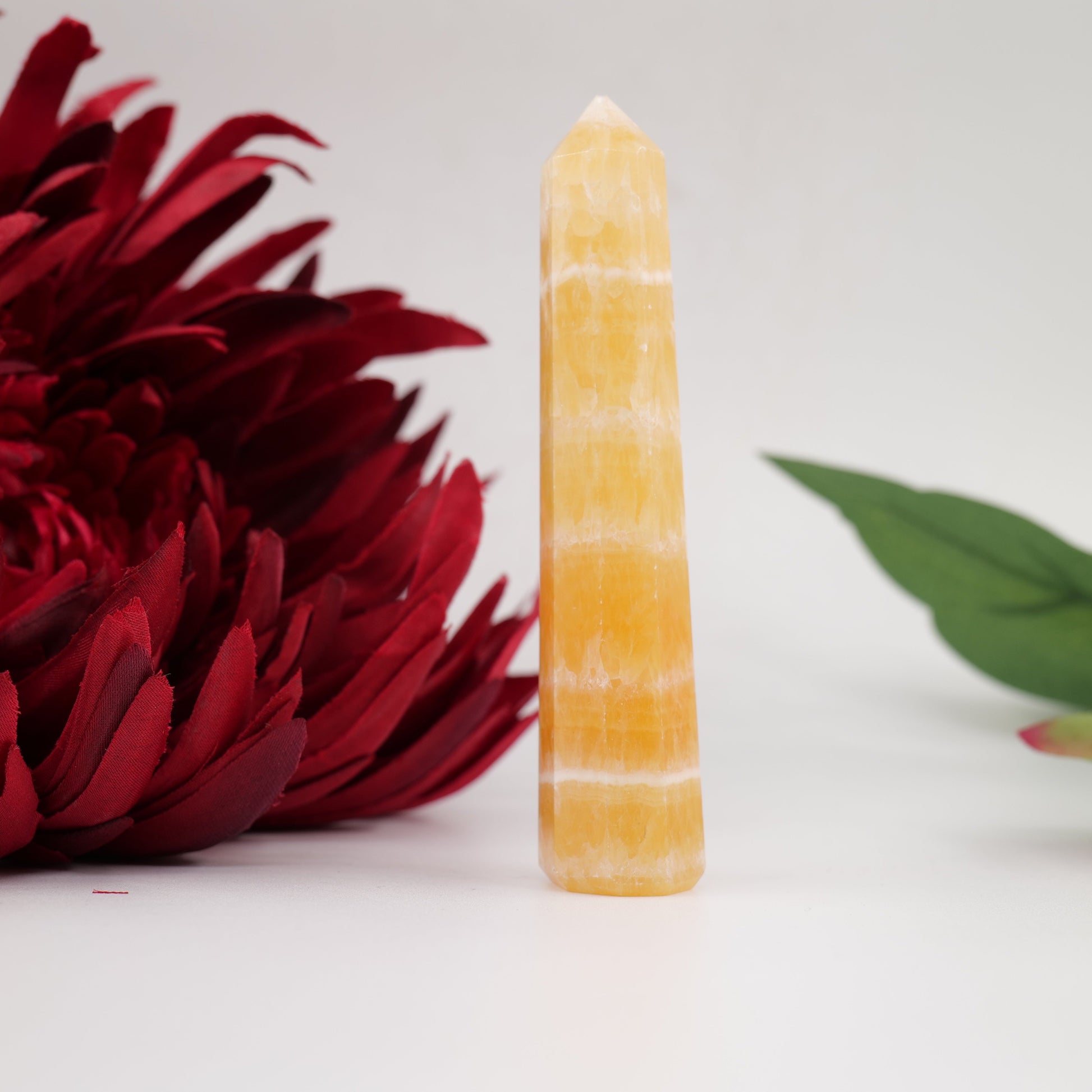 Polished Yellow Banded Mexican Calcite Tower 57G 100Mm featuring soft translucent tone and gentle sheen - Positive Faith Hope Love